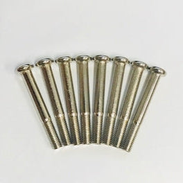 A set of silver-colored screws arranged in a fan-like spread on a light background.