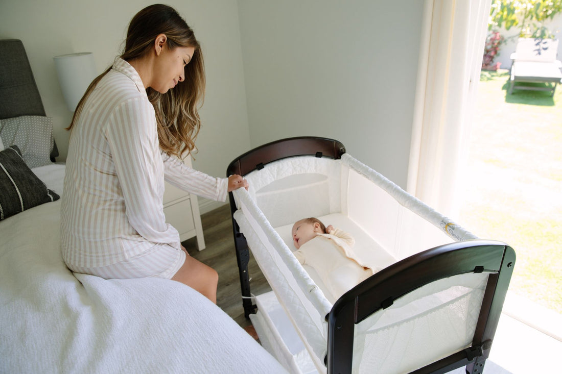 https://www.armsreach.com/cdn/shop/articles/Cambria_Co-Sleeper_Bedside_Baby_Bassinet.jpg?v=1686948886&width=1100