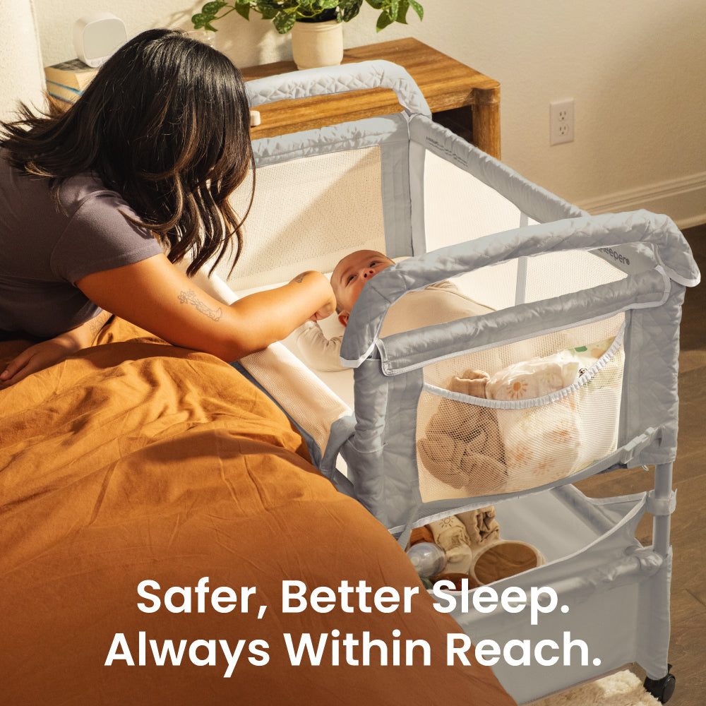 Woman with a baby in a crib next to a bed, with text 'Safer, Better Sleep. Always Within Reach.'