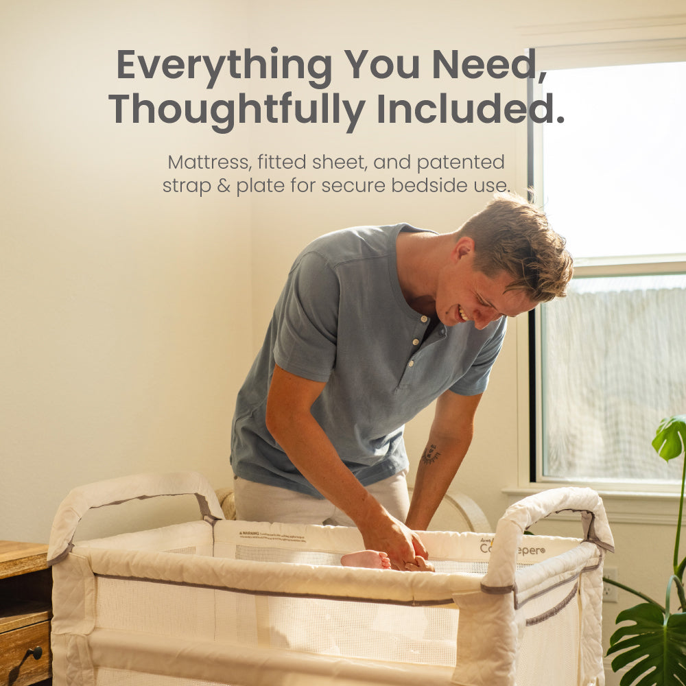 Man setting up a baby crib with text about included items.