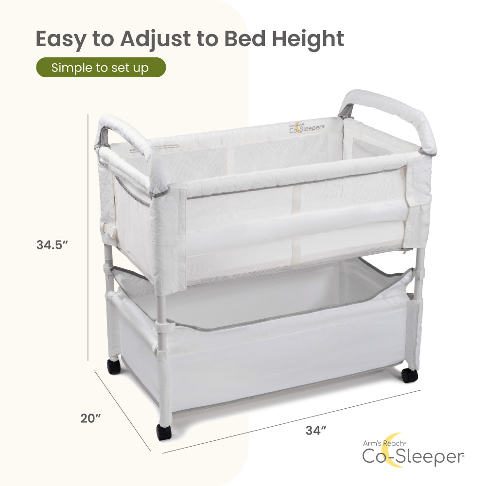 White Co-Sleeper with dimensions and setup instructions on a white background