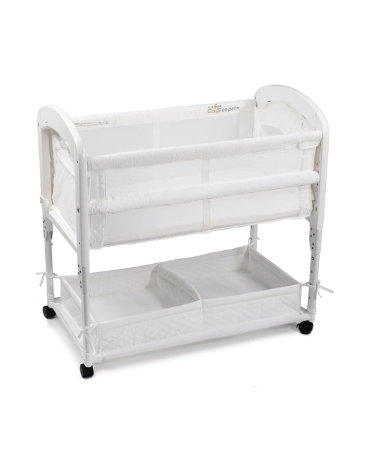 White baby crib with wheels on a white background