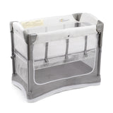 Arm's Reach Mini Ezee 3-in-1 Co-Sleeper bedside bassinet in grey and white