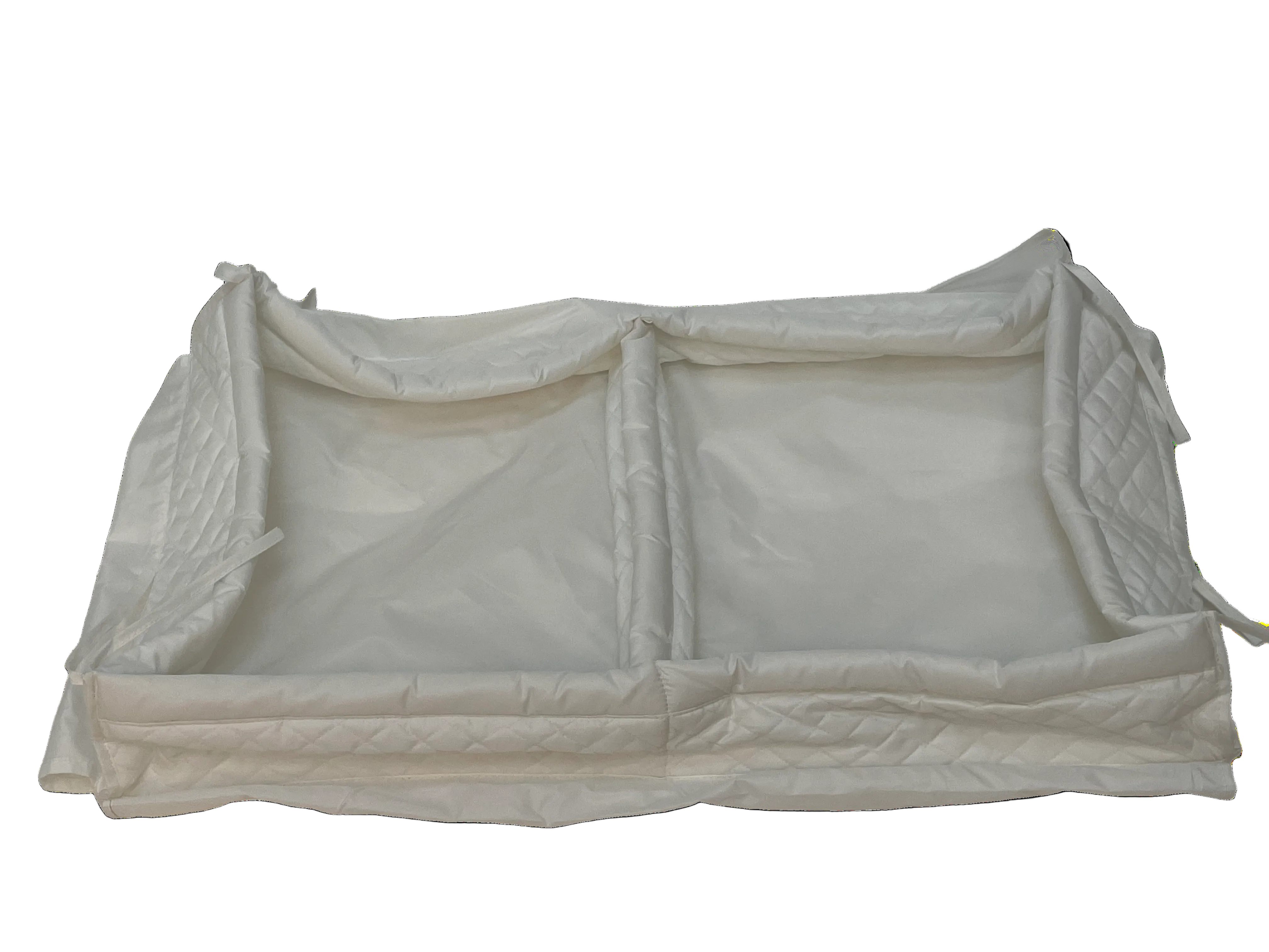 White quilted cover on a white background