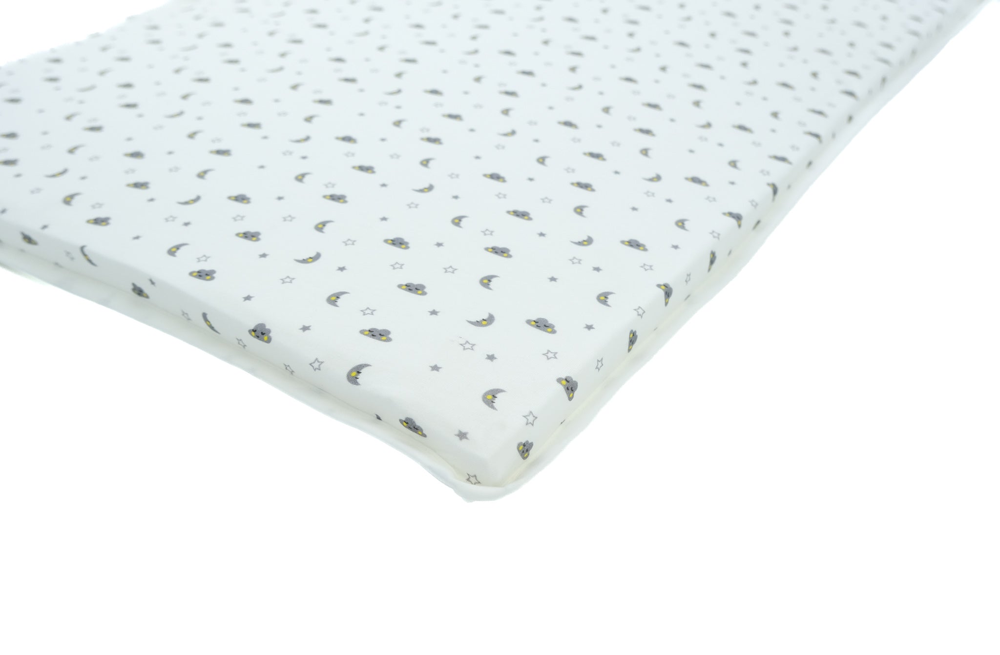 Printed cotton bassinet sheet shown on a Co-Sleeper bassinet