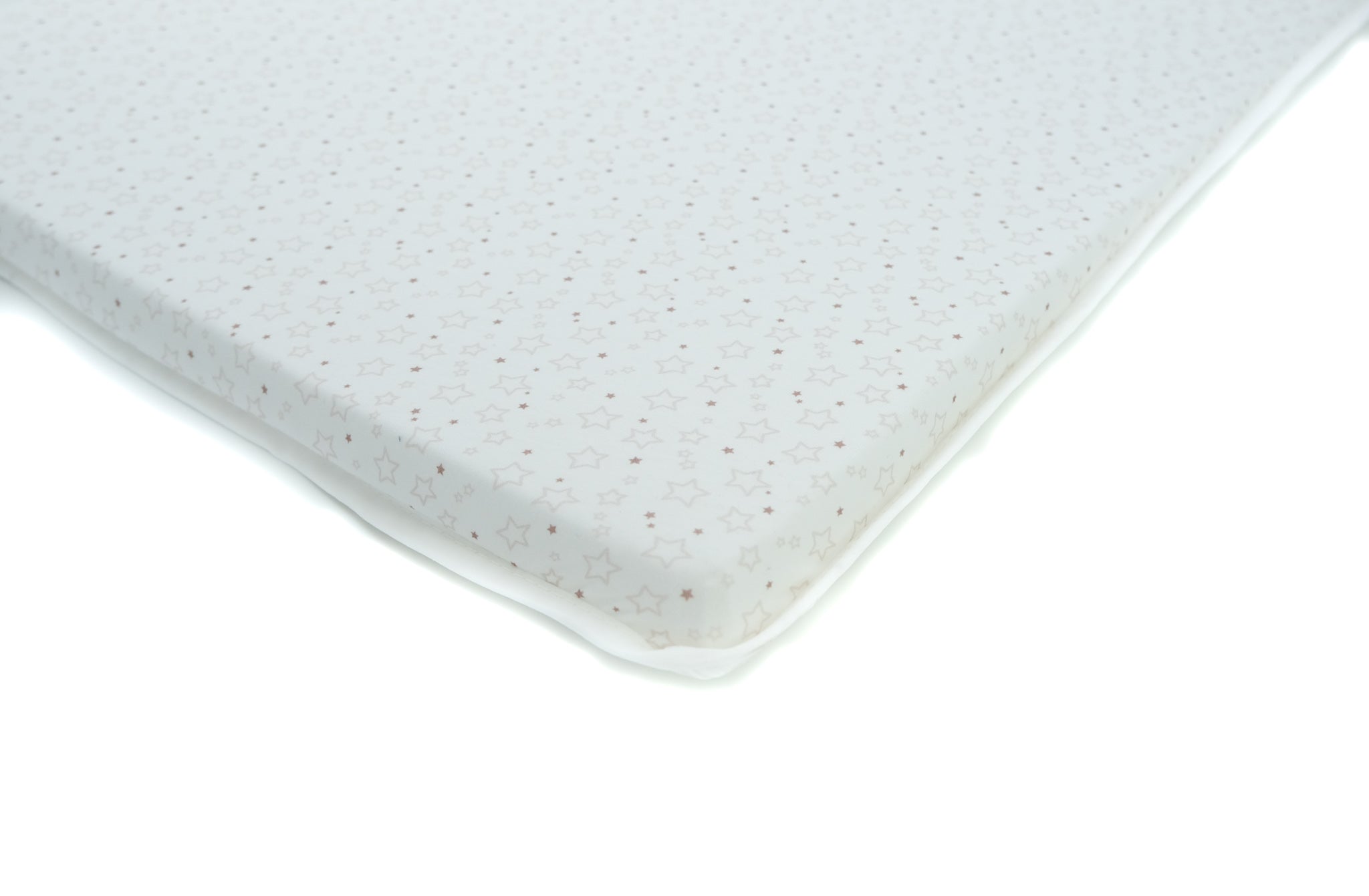 Printed cotton bassinet sheet shown on a Co-Sleeper bassinet
